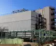 Écran acoustique pour matériel industriel extérieur