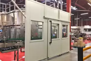 Acoustic shielding in bottling line