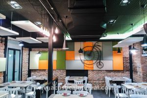 Decorative acoustic treatment in a restaurant